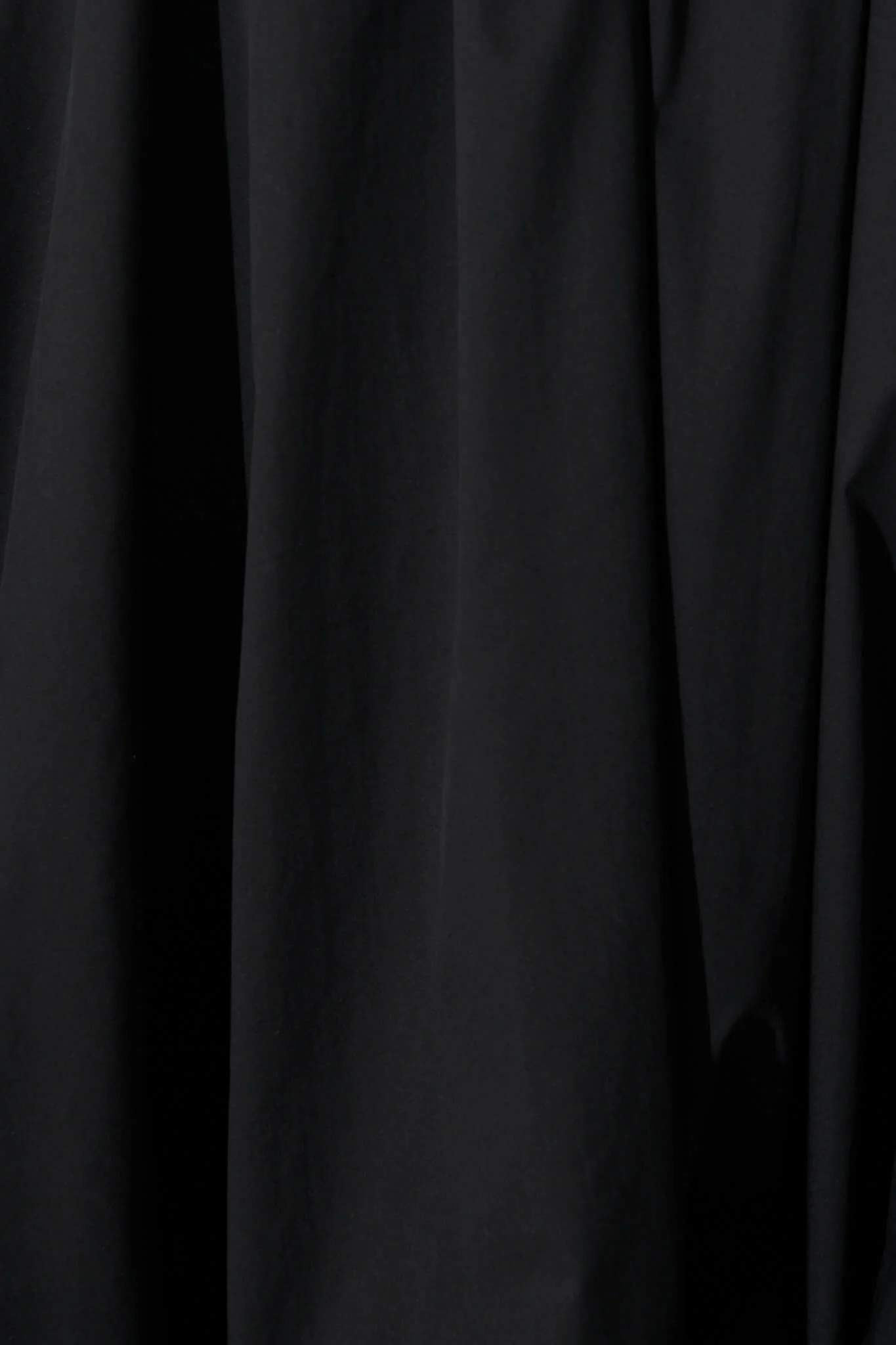 Bryson Bubble Hem Dress in Black Cotton - Image 6