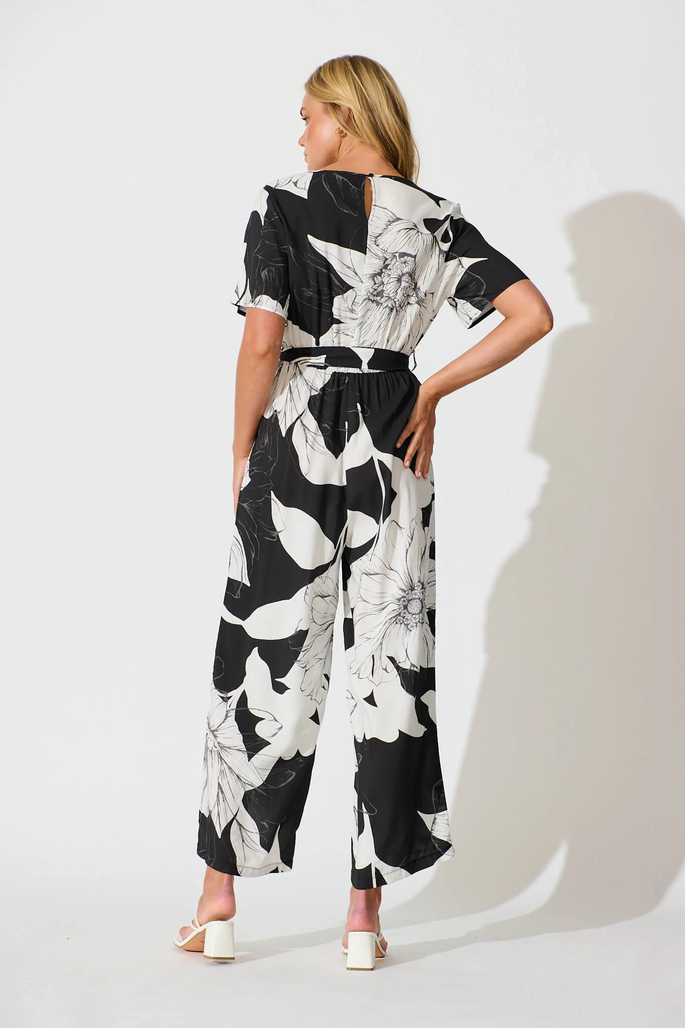 Calliope Jumpsuit In Black With White Floral - Image 4