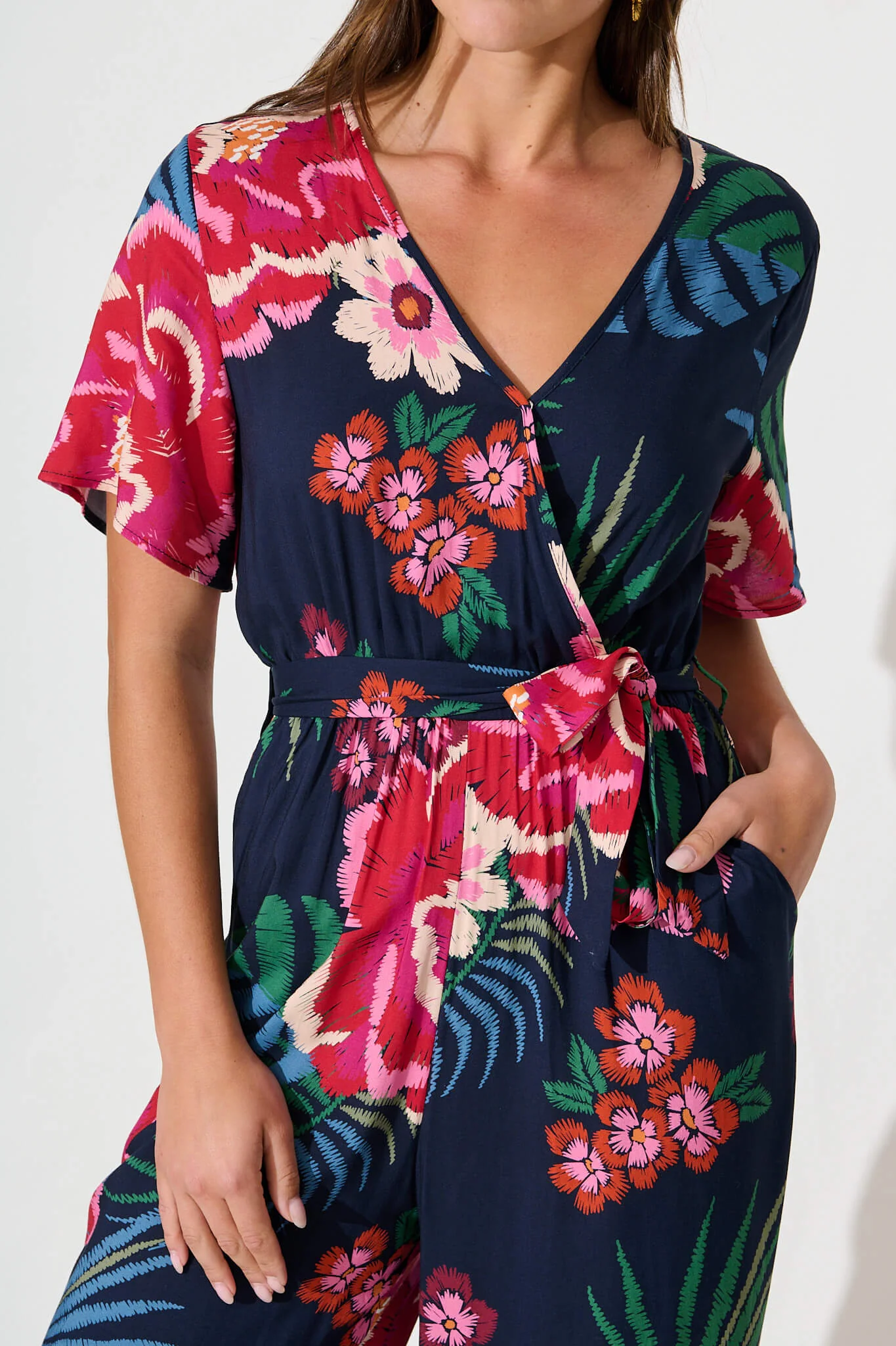 Calliope Jumpsuit In Navy With Red Floral Print - Image 5