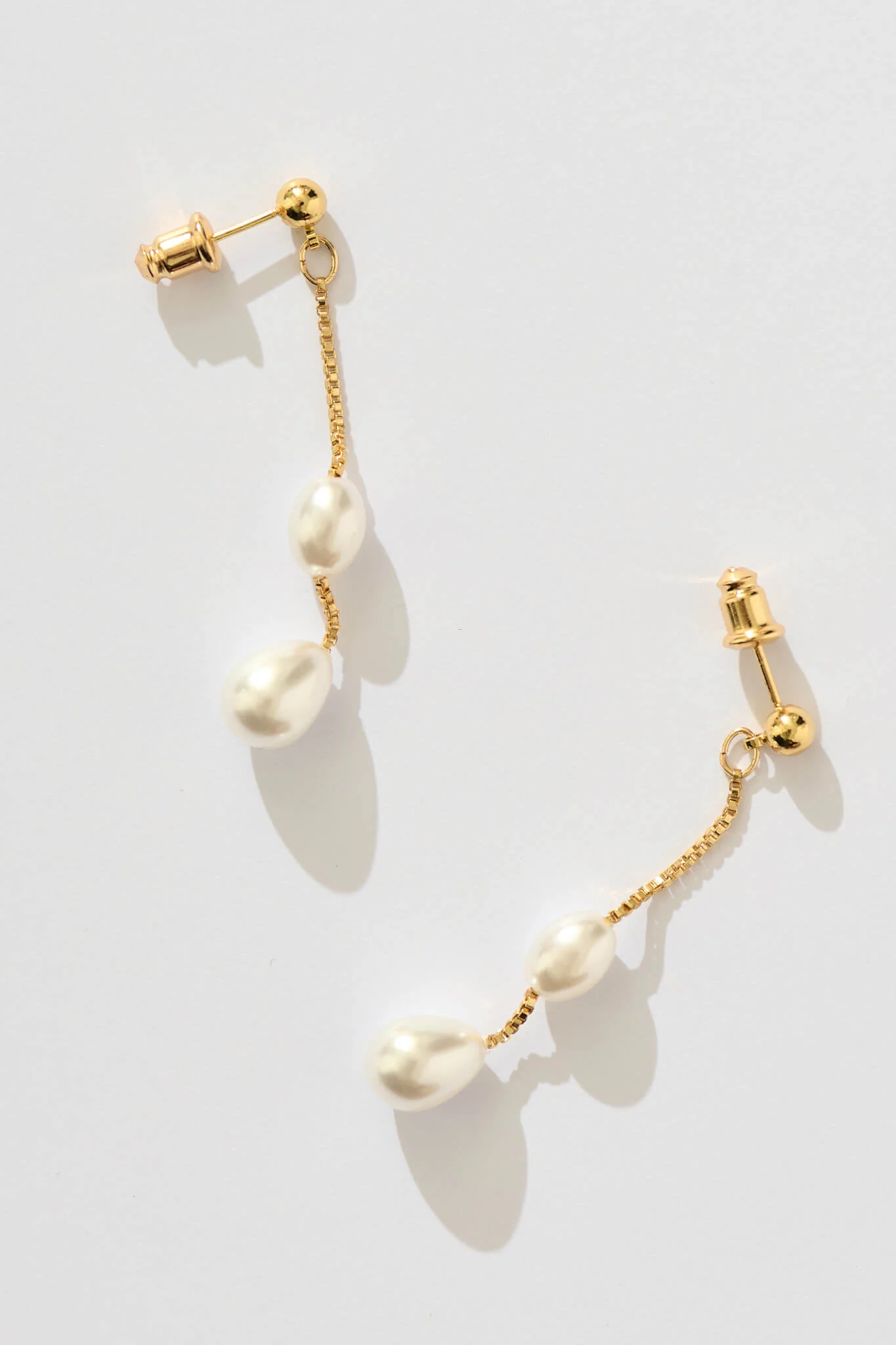 Dainty Drop Pearl Earrings in Gold - Image 5
