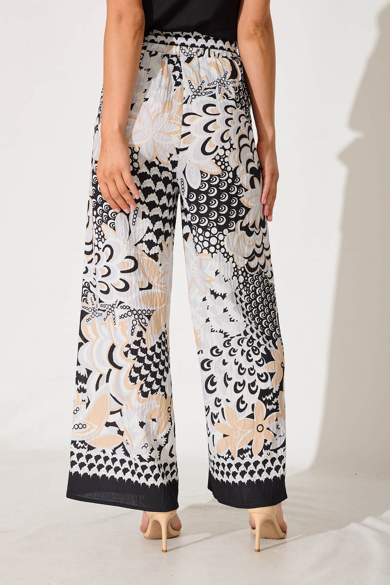 Forsythia Pant In Black With Beige Print - Image 3