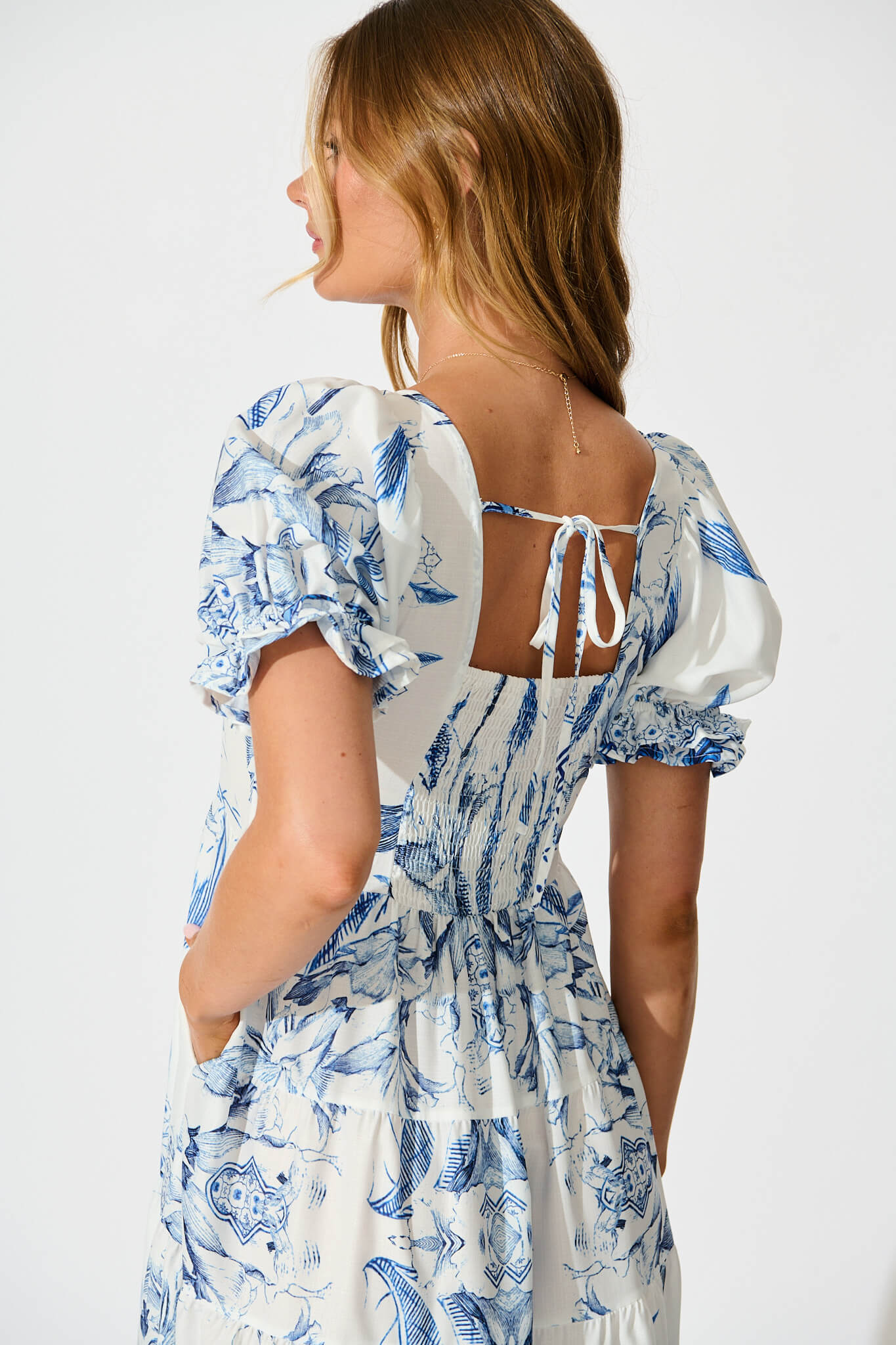 Roseau Midi Dress in White with Blue Floral Border - Image 5