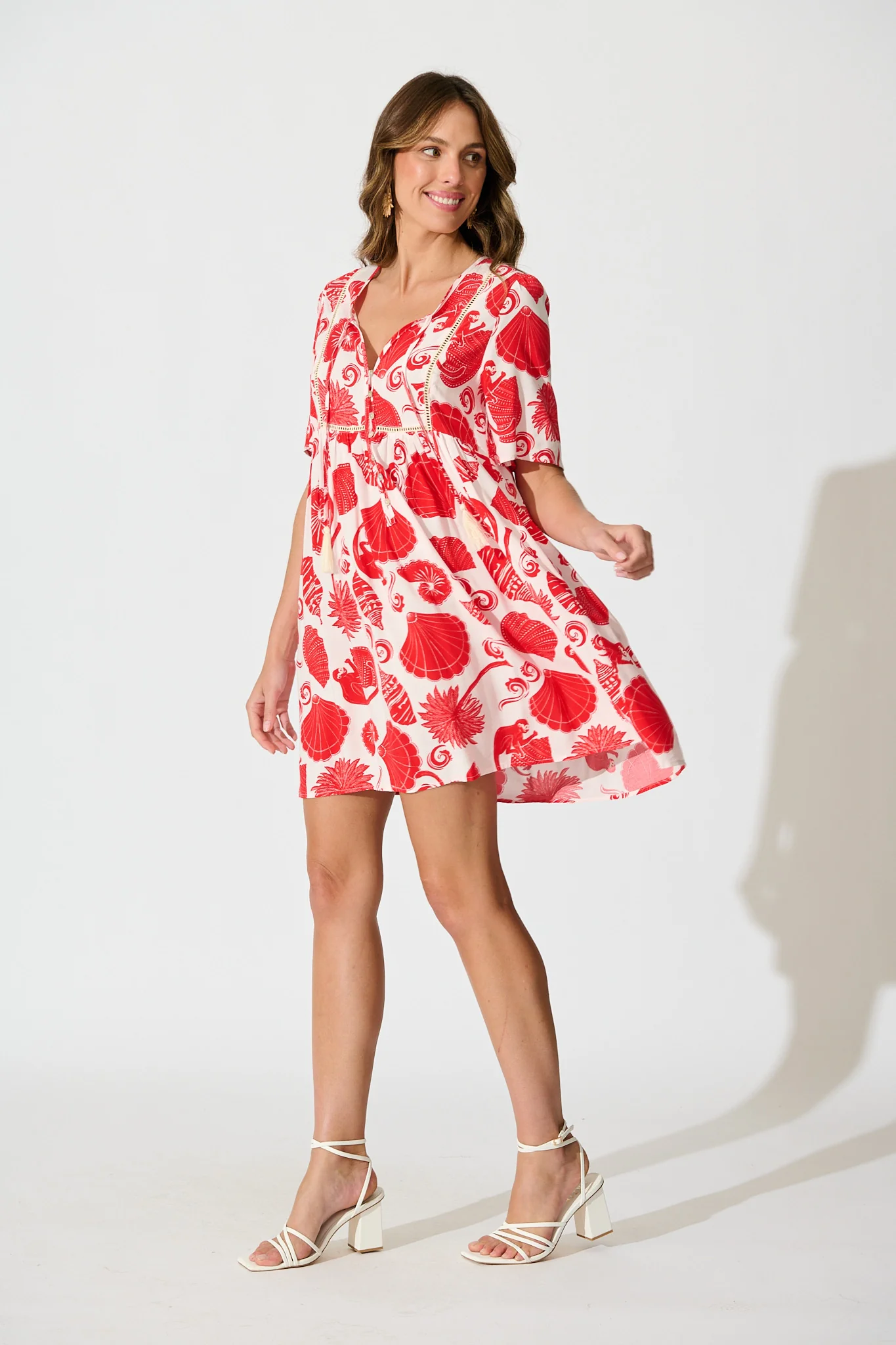 Shake It Out Smock Dress in Off White with Red Shell Print - Image 3